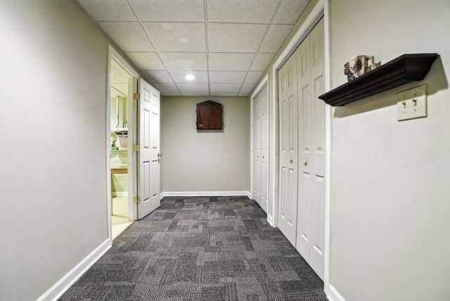 8 Birchwood Ln Unit 8, Hopkinton, MA 01748 - hall featuring dark carpet, a paneled ceiling, and recessed lighting