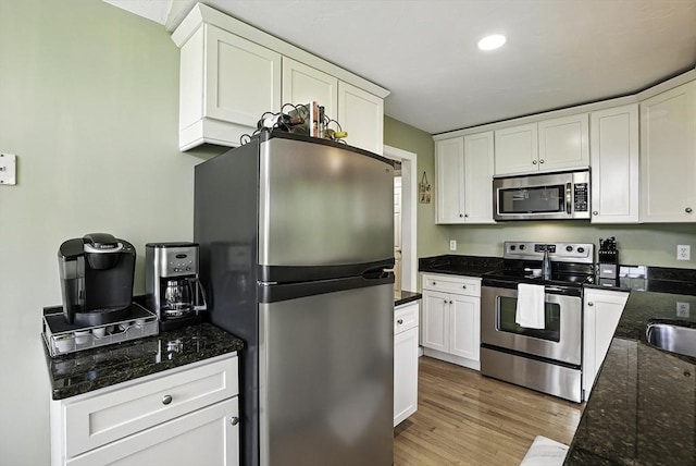 8 Birchwood Ln Unit 8, Hopkinton, MA 01748 - kitchen with appliances with stainless steel finishes, white cabinets, and recessed lighting