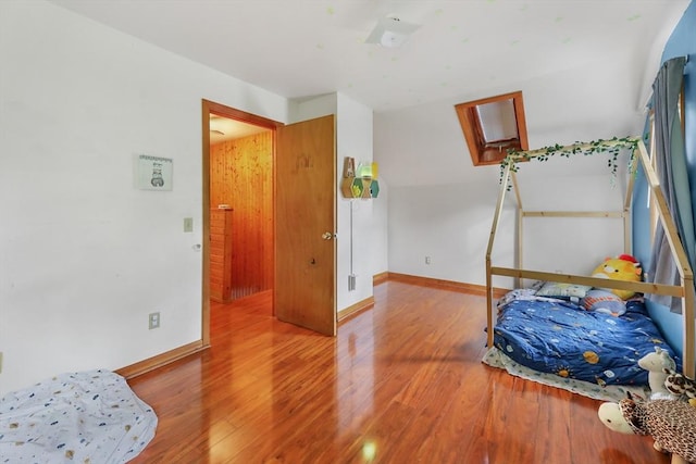 bedroom featuring hardwood / wood-style floors