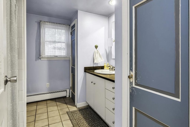 453 Washington St, Gloucester, MA 01930 - full bathroom with a baseboard radiator, vanity, and tile patterned floors