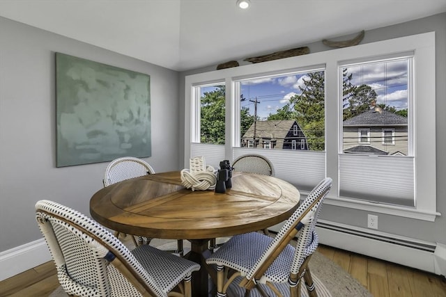 453 Washington St, Gloucester, MA 01930 - dining area featuring a baseboard radiator, wood finished floors, baseboards, and recessed lighting