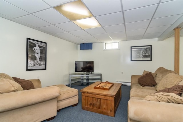 carpeted living area featuring a baseboard radiator and a paneled ceiling