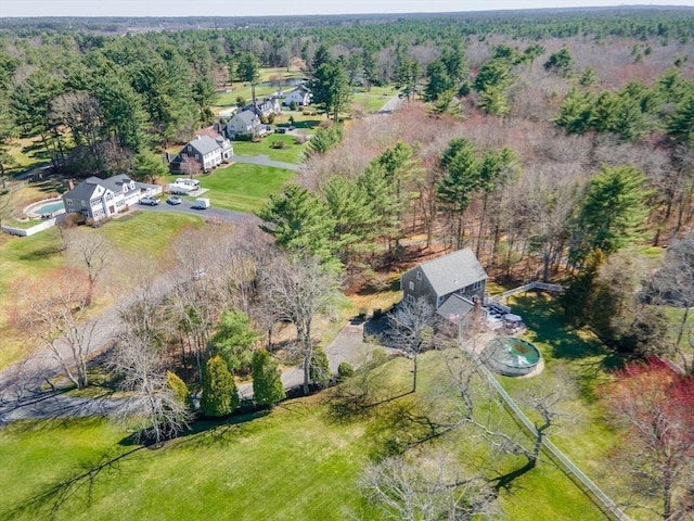 aerial view with a wooded view