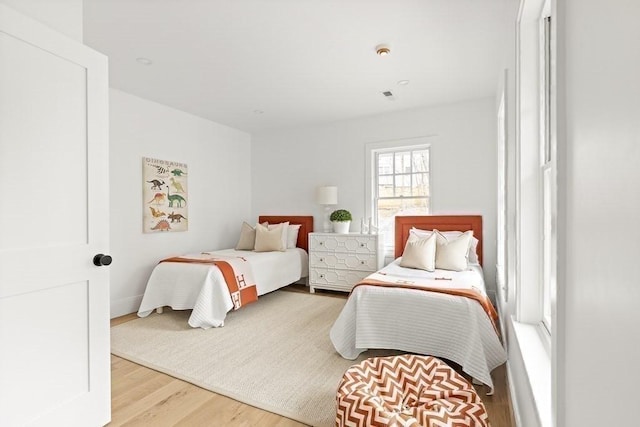 bedroom featuring light hardwood / wood-style flooring