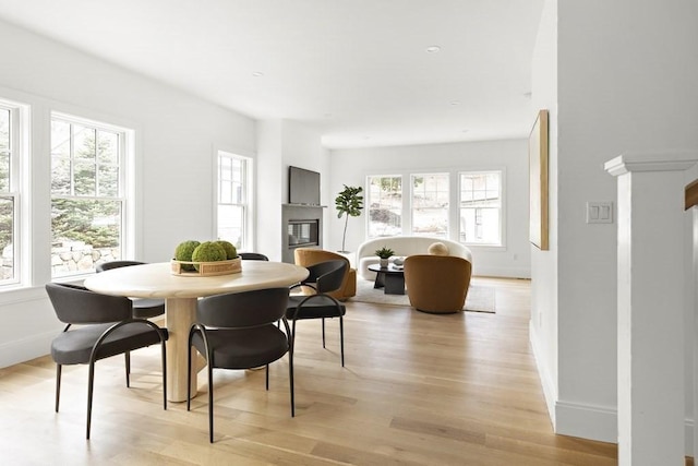 dining area with light wood-type flooring