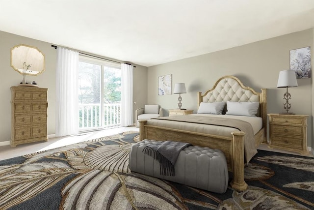 bedroom with carpet floors and baseboards