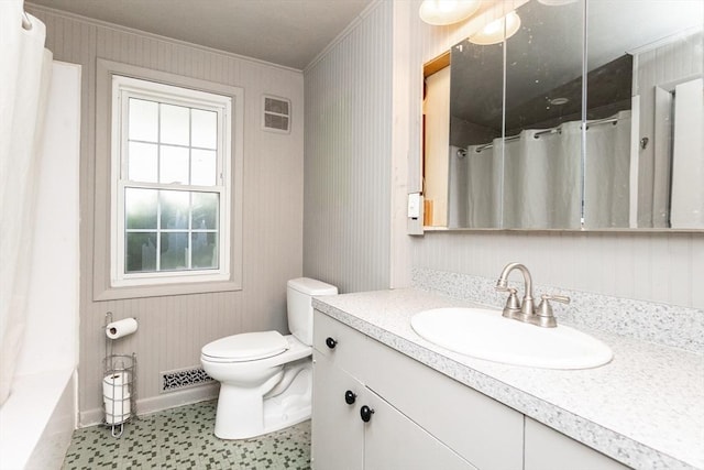 bathroom featuring crown molding, toilet, a shower with shower curtain, and vanity