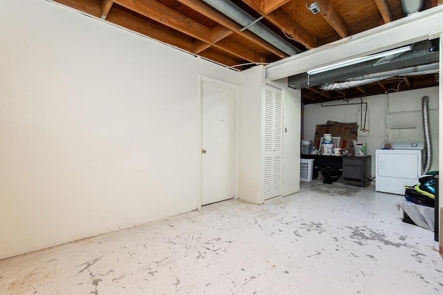 unfinished basement featuring washer / clothes dryer