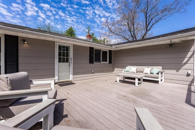 wooden deck with outdoor lounge area