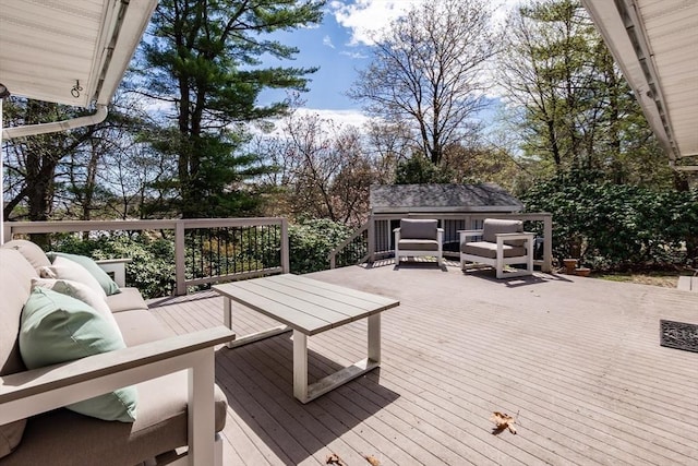 wooden terrace with outdoor lounge area