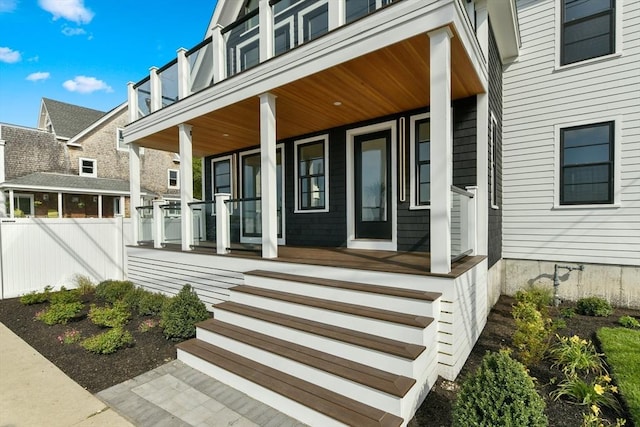 87 Dorchester St, Quincy, MA 02171 - view of exterior entry featuring covered porch and fence