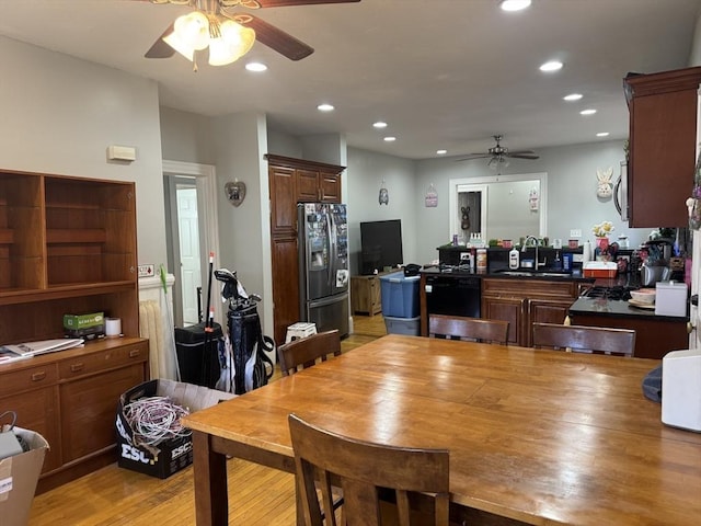 dining space featuring light wood finished floors, recessed lighting, and a ceiling fan