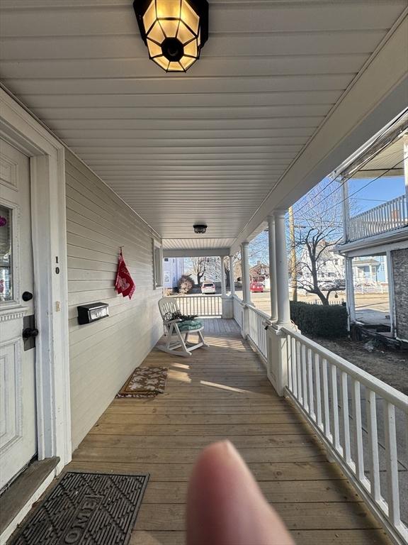 wooden deck featuring a porch