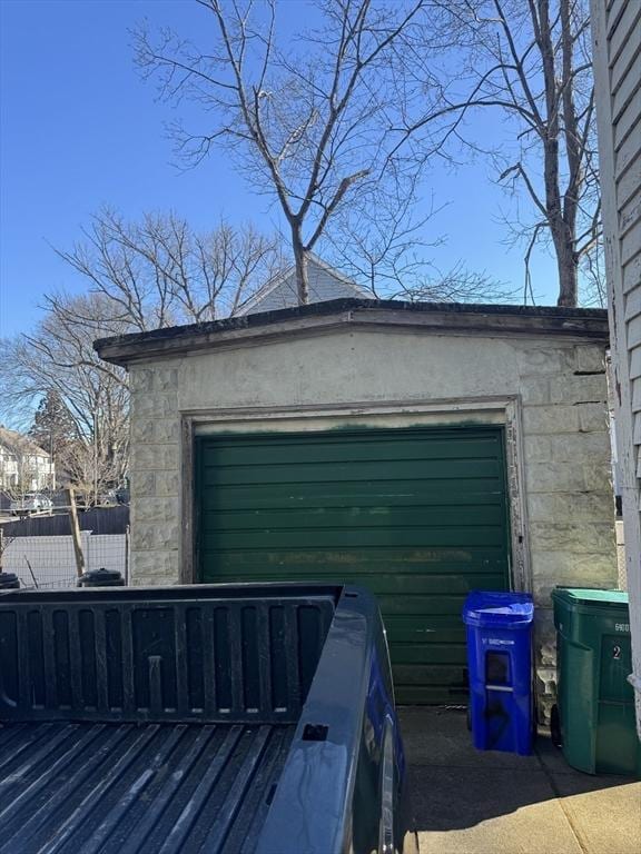 garage featuring fence