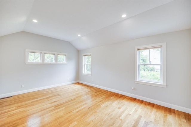 15 Hydrangea Cir, Falmouth, MA 02536 - spare room featuring lofted ceiling, baseboards, light wood-style flooring, and recessed lighting