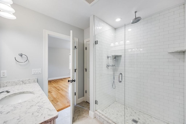 15 Hydrangea Cir, Falmouth, MA 02536 - bathroom with a stall shower, vanity, and recessed lighting