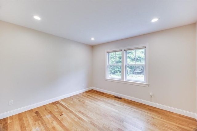 15 Hydrangea Cir, Falmouth, MA 02536 - unfurnished room featuring baseboards, light wood finished floors, and recessed lighting