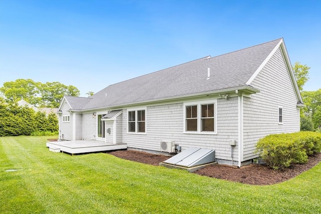15 Hydrangea Cir, Falmouth, MA 02536 - back of property with a wooden deck, roof with shingles, a yard, and ac unit