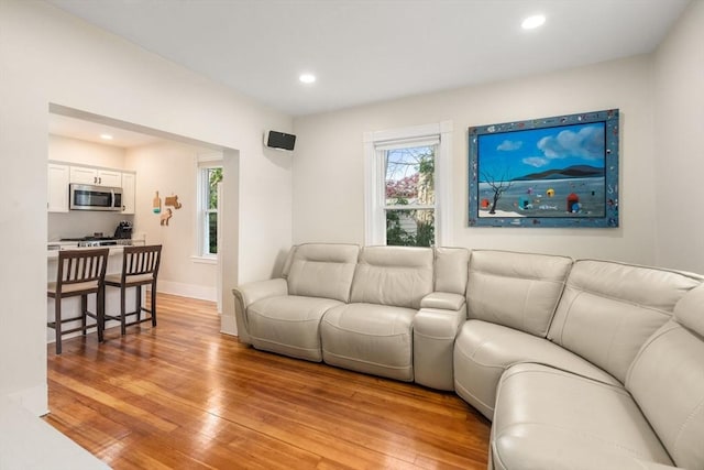 13 Darling St, Acushnet, MA 02743 - living room featuring light wood-style flooring, baseboards, and recessed lighting