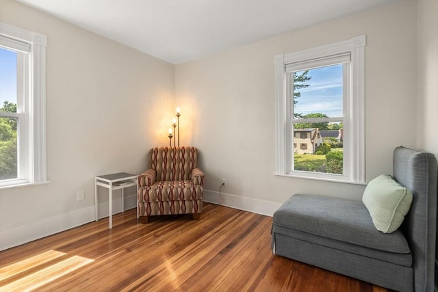 13 Darling St, Acushnet, MA 02743 - sitting room featuring wood finished floors and baseboards