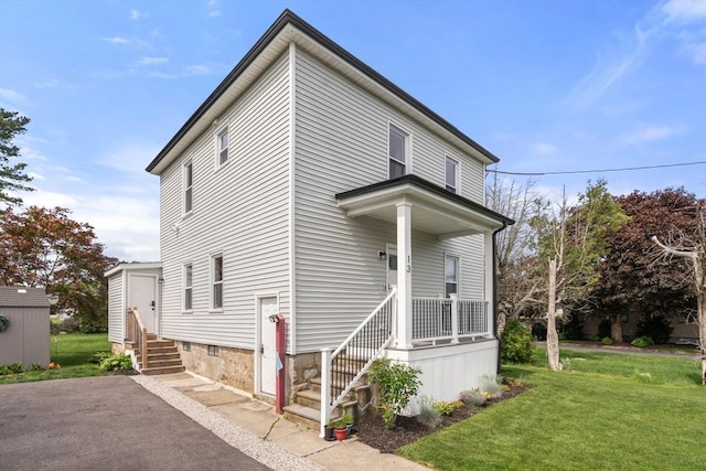 13 Darling St, Acushnet, MA 02743 - view of front of property with a front yard and entry steps