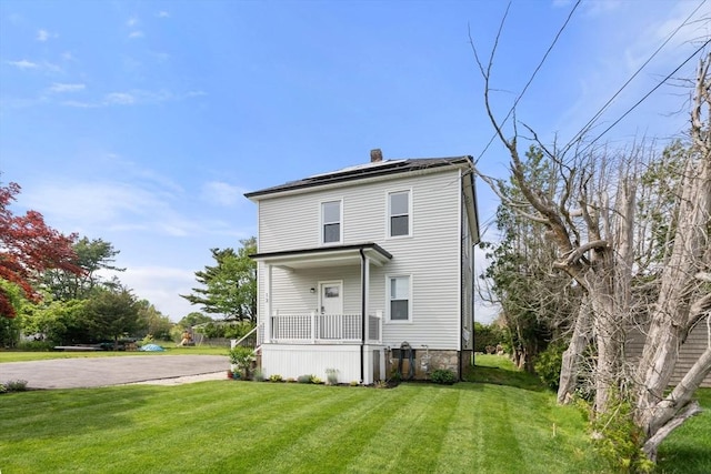 13 Darling St, Acushnet, MA 02743 - rear view of property featuring a yard and a chimney