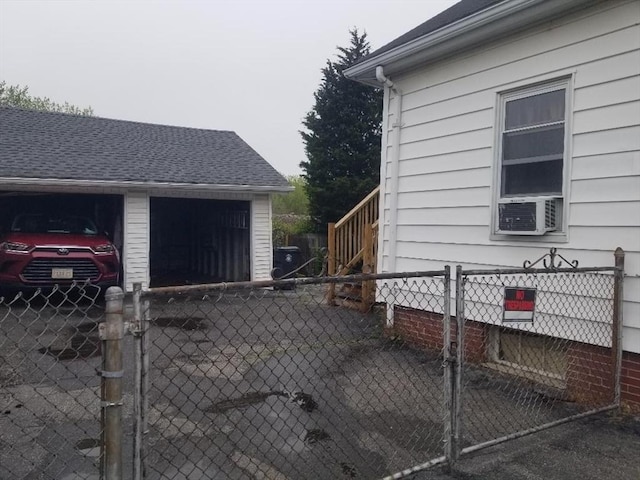 1166 Douglas Ave, North Providence, RI 02904 - view of side of home with fence, cooling unit, and a gate