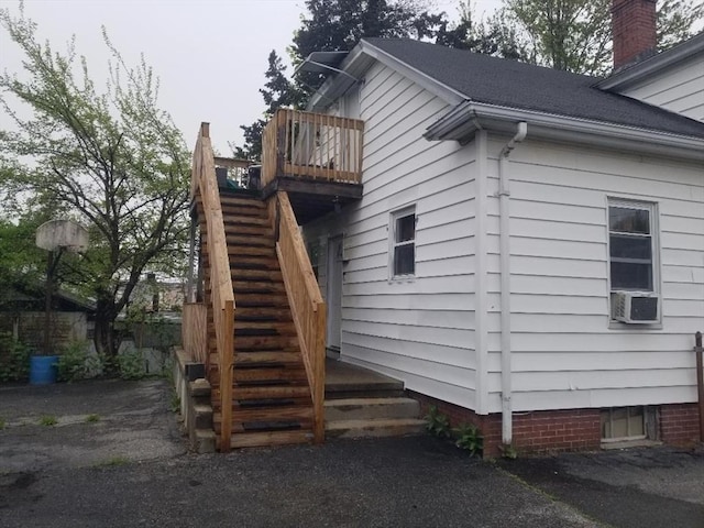 1166 Douglas Ave, North Providence, RI 02904 - view of home's exterior featuring stairway and cooling unit