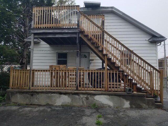 1166 Douglas Ave, North Providence, RI 02904 - rear view of house with stairway