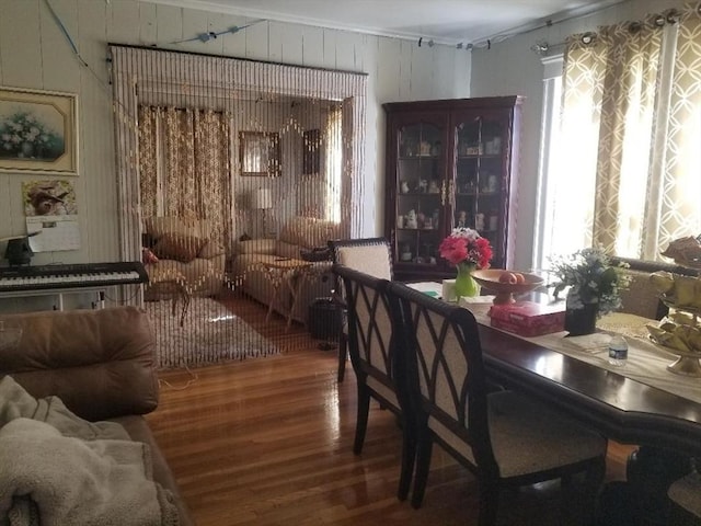 1166 Douglas Ave, North Providence, RI 02904 - dining area featuring wood finished floors, ornamental molding, and wooden walls