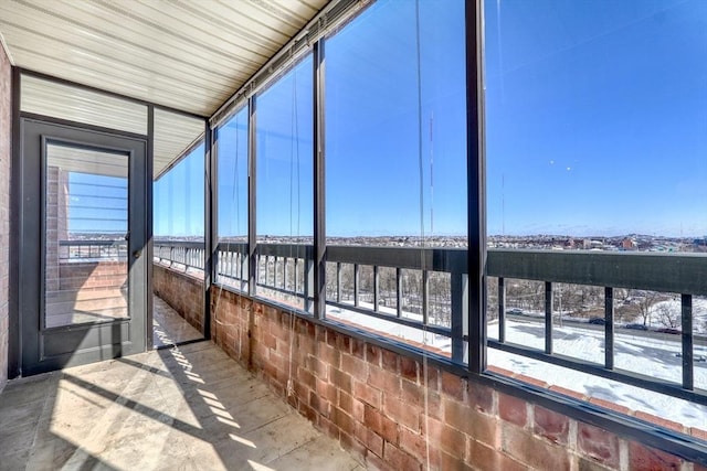 unfurnished sunroom with a healthy amount of sunlight