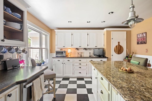 63 Hawthorne, Weymouth, MA 02189 - kitchen with dark floors, white cabinets, hanging light fixtures, glass insert cabinets, and recessed lighting
