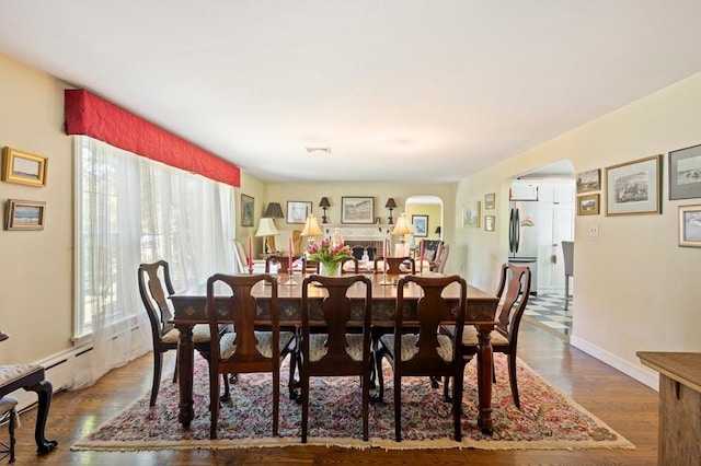63 Hawthorne, Weymouth, MA 02189 - dining space featuring arched walkways, healthy amount of natural light, and baseboards