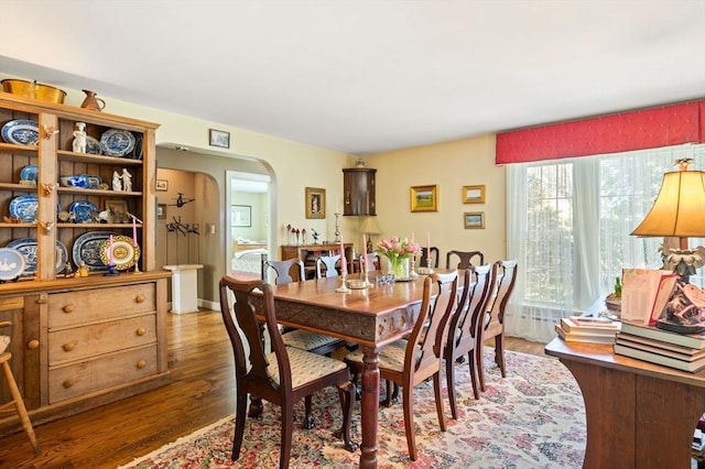 63 Hawthorne, Weymouth, MA 02189 - dining space featuring arched walkways and wood finished floors