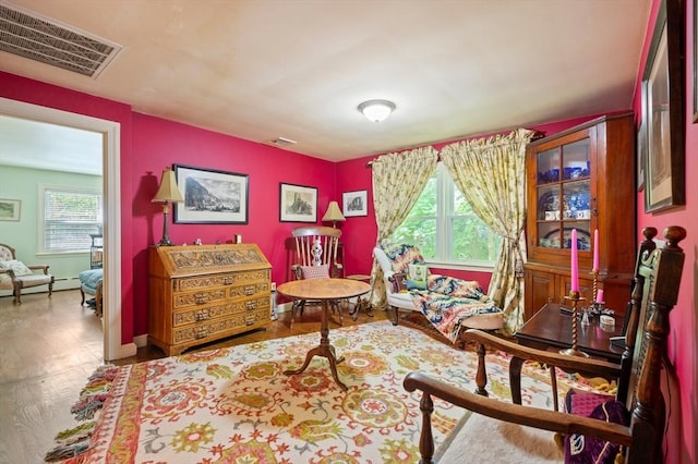 63 Hawthorne, Weymouth, MA 02189 - living area with wood finished floors, baseboards, and baseboard heating