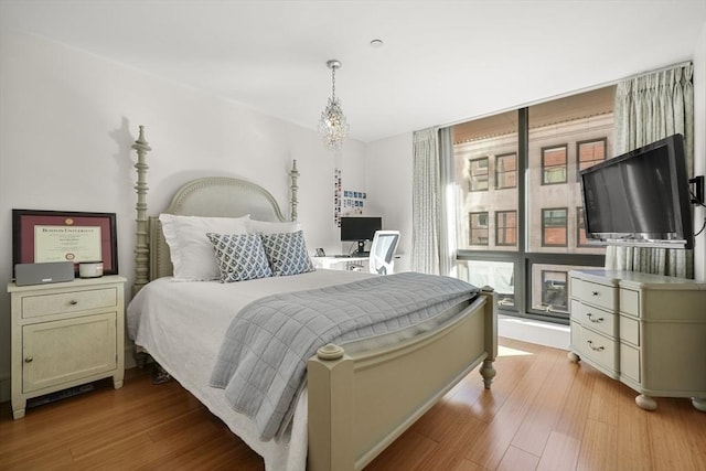 bedroom featuring light wood-type flooring