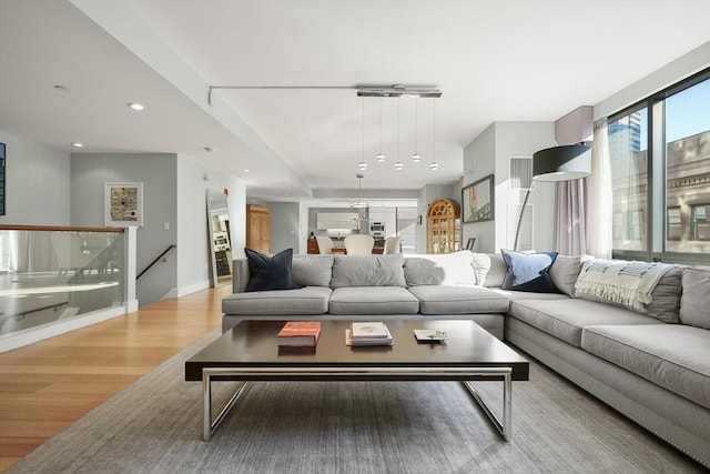 living room with light hardwood / wood-style flooring