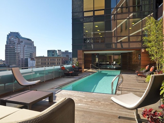 view of pool with a water slide