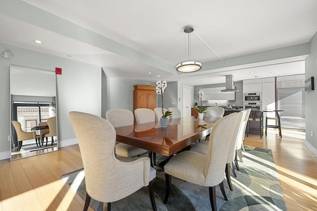 dining room featuring light hardwood / wood-style flooring