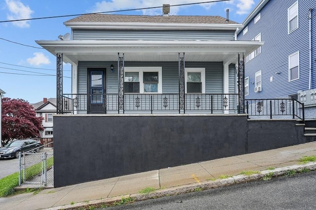 160 Stewart St, Fall River, MA 02720 - view of front of house with a porch and a gate
