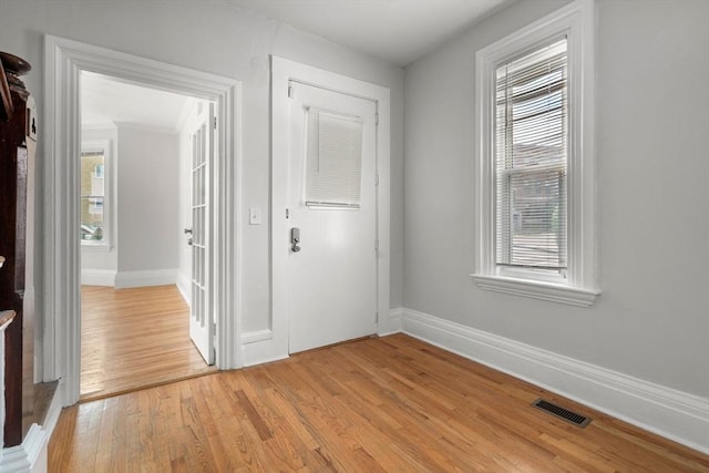 117 Babson St, Boston, MA 02126 - unfurnished bedroom featuring baseboards and light wood-style flooring