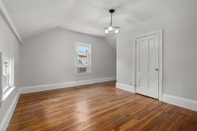 117 Babson St, Boston, MA 02126 - additional living space with wood-type flooring, lofted ceiling, and a chandelier