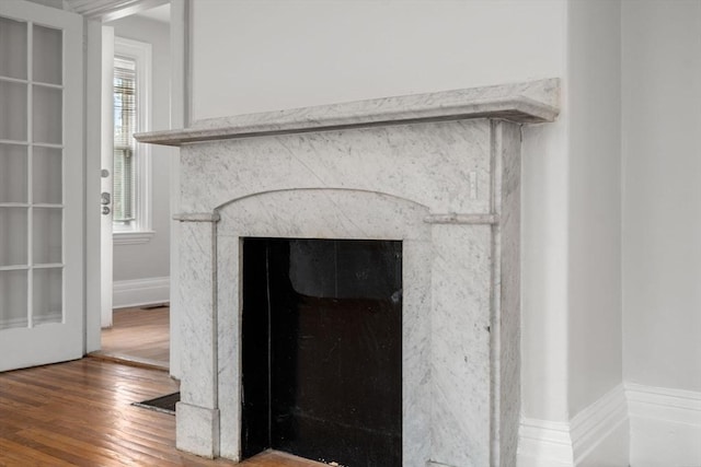 117 Babson St, Boston, MA 02126 - detailed view of a high end fireplace and wood finished floors