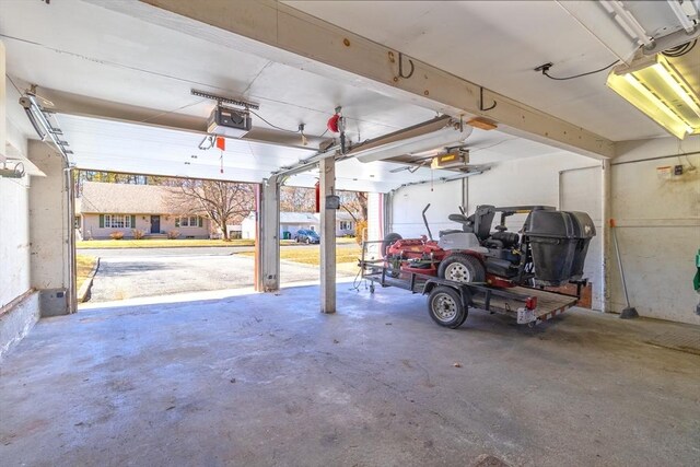 garage featuring a garage door opener