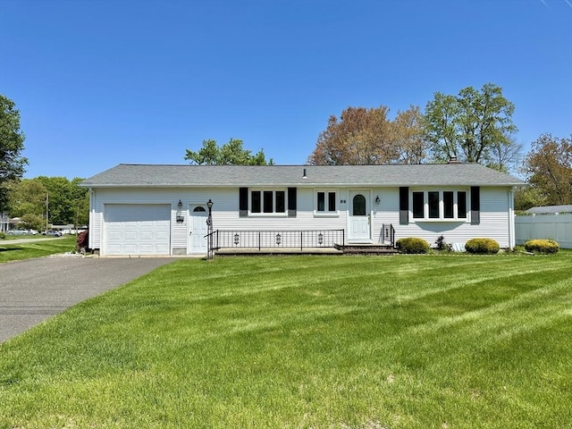 89 Napoleon Ave, Ludlow, MA 01056 - ranch-style house featuring a garage, driveway, and a front yard