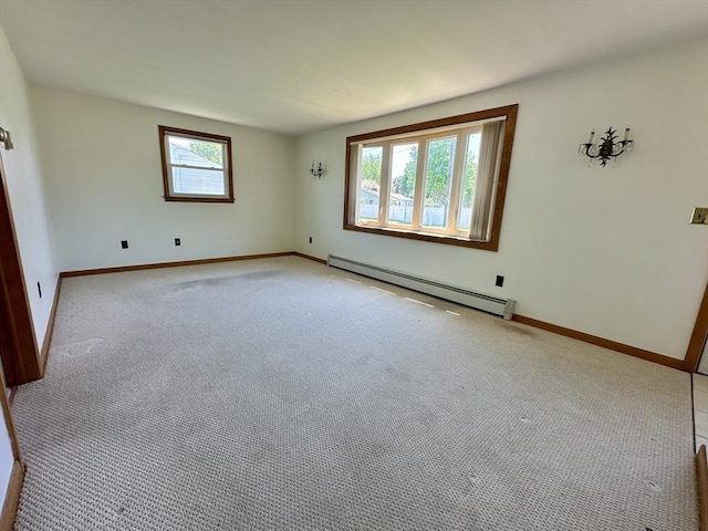 89 Napoleon Ave, Ludlow, MA 01056 - empty room featuring baseboard heating, baseboards, and light carpet