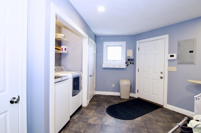 laundry room featuring washing machine and dryer and electric panel