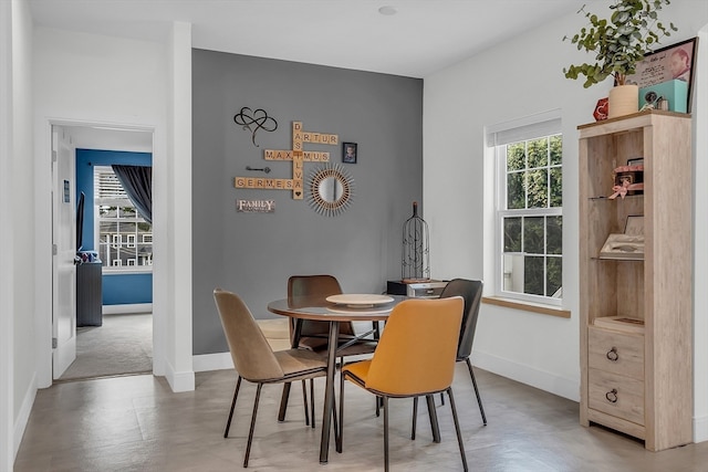 dining area featuring plenty of natural light