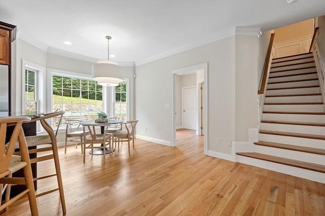 17 Arrowhead Ln, Westborough, MA 01581 - dining space featuring light wood finished floors, stairs, ornamental molding, and recessed lighting