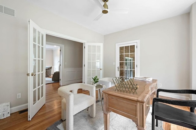 17 Arrowhead Ln, Westborough, MA 01581 - home office with french doors, ceiling fan, light wood-style flooring, and wainscoting